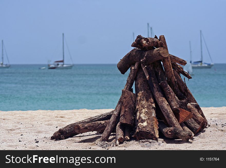 A wood pyre on the beach at Rodney Bay, St. Lucia. A wood pyre on the beach at Rodney Bay, St. Lucia