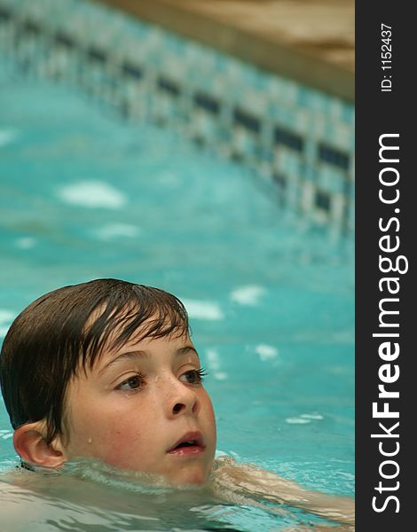 Child having fun swimming in pool. Child having fun swimming in pool