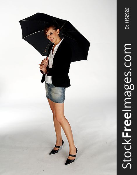 Girl holding umbrella - studio shot -. Girl holding umbrella - studio shot -