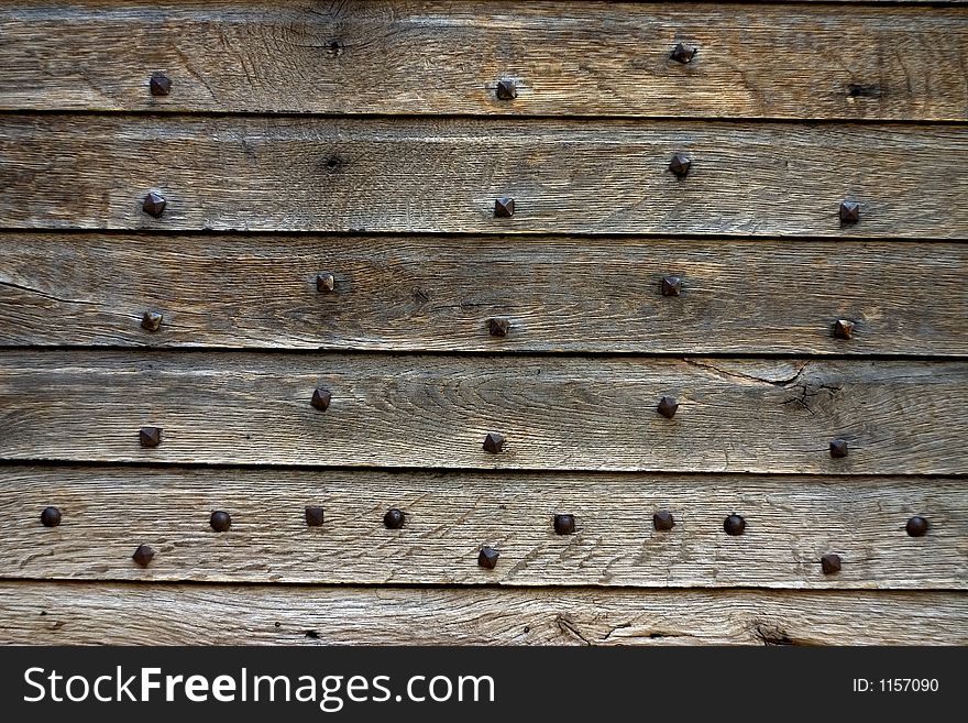 Studded ancient door detail