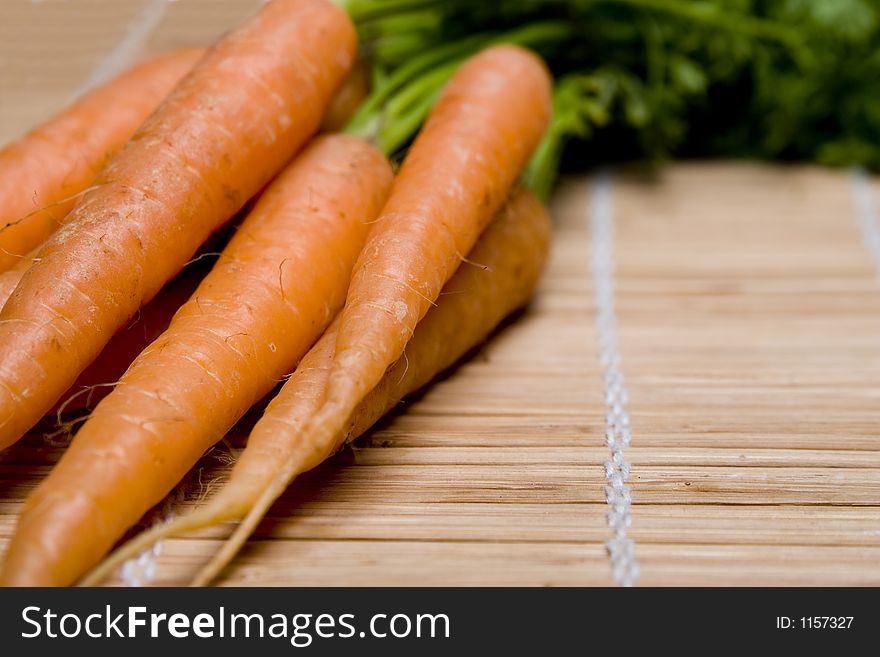 Fresh carrots with stems attached