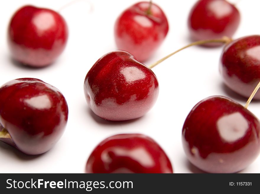 Isolated perfect juicy red cherries