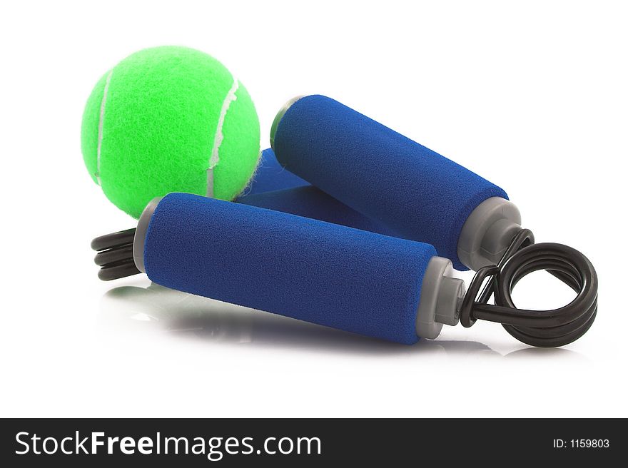 Handgrip strenghtening sports gear with tennis ball. Handgrip strenghtening sports gear with tennis ball