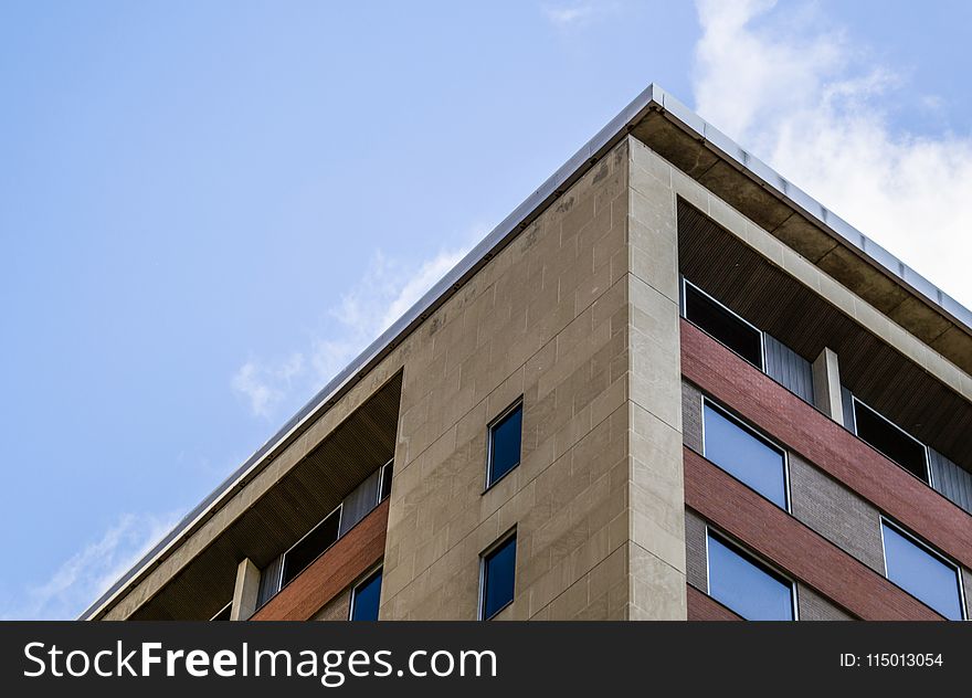 Low Angle Photography of Brown Concrete Building