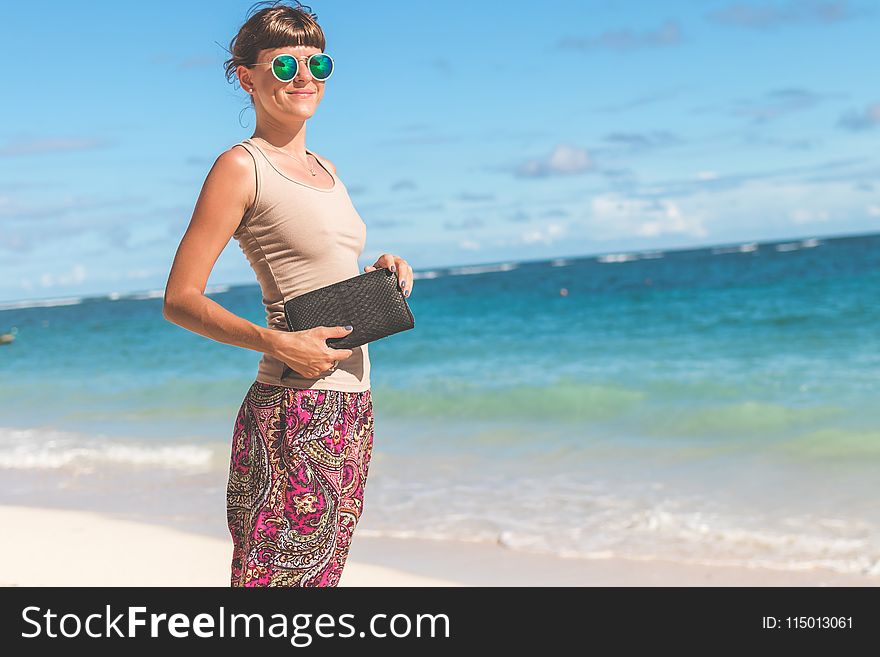 photography of a Woman On Beach
