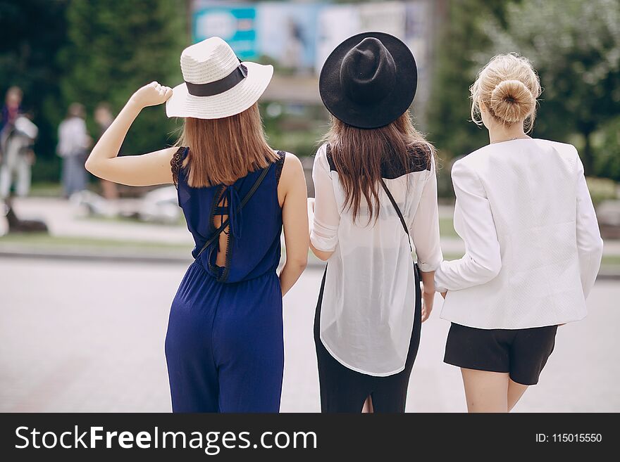 Beautiful young girls outdoors in Sunny weather