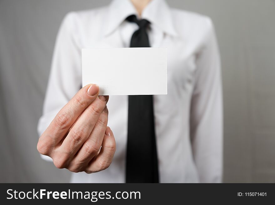 Businesswoman Holding A Business Card. Mock Up. Copy Space.