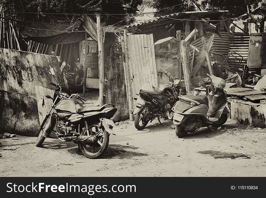 Grayscale Photo of Motorcycles