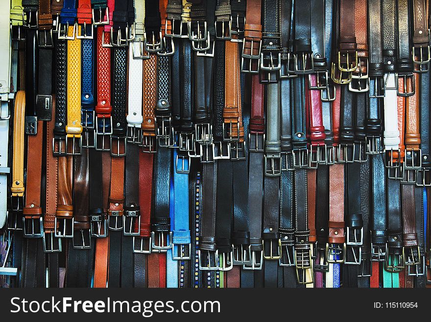 Shallow Focus Photography Of Assorted-color Leather Belts