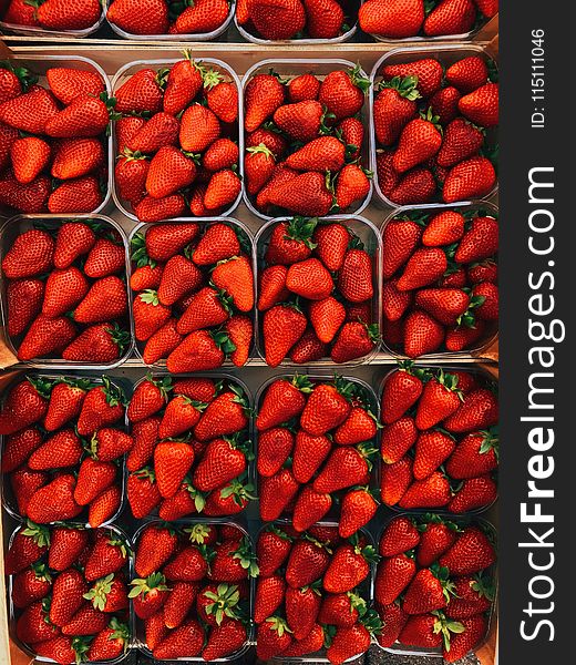 Top View Photography of Strawberries on Containers