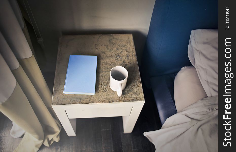 Photography of Side Table Near Bed
