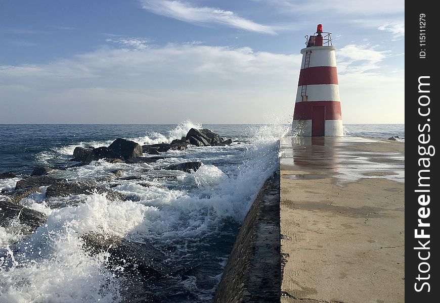 Photo Of Red And White Lighthouse