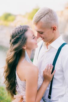 Elegant Curly Bride And Groom Outdoors On The Background The Lake Stock Images Elegant Curly Bride And Groom Outdoors On The Background The Lake Stock Images