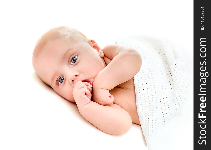 Portrait of a four months old baby on white background