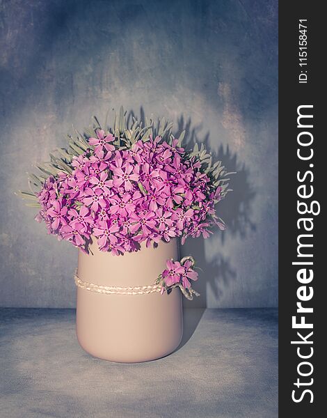 Romantic Floral Arrangement With Fresh Pink Flowers Close-up, Spring Blossom Bouquet In A Pastel Vase On Vintage Blue Background