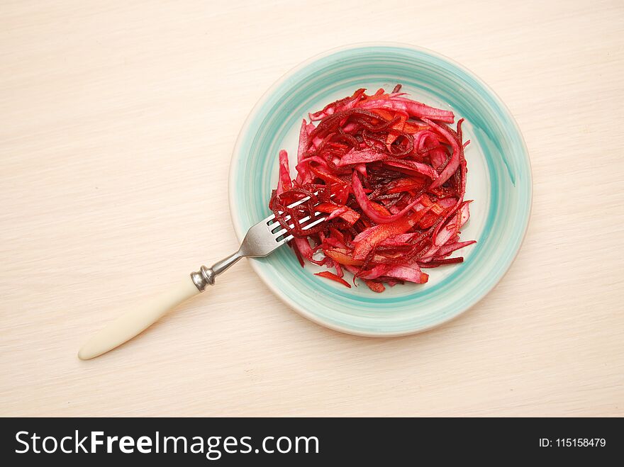 Salad Diet fitness Health Carrot and Raw Beet wit fork rustic Table Isoalted