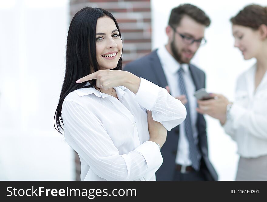 Beautiful women manager and co-workers in the office. photo has a blank space for text. Beautiful women manager and co-workers in the office. photo has a blank space for text.