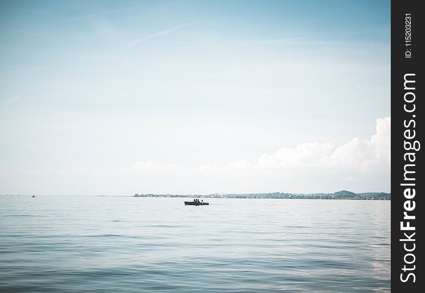 Boat on Calm Body of Water