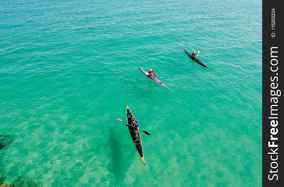 Three Yellow and Pink Kayak