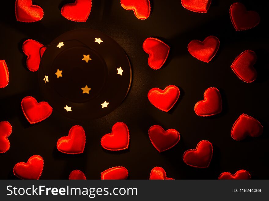 Lantern and small red hearts on dark background. Lantern and small red hearts on dark background.