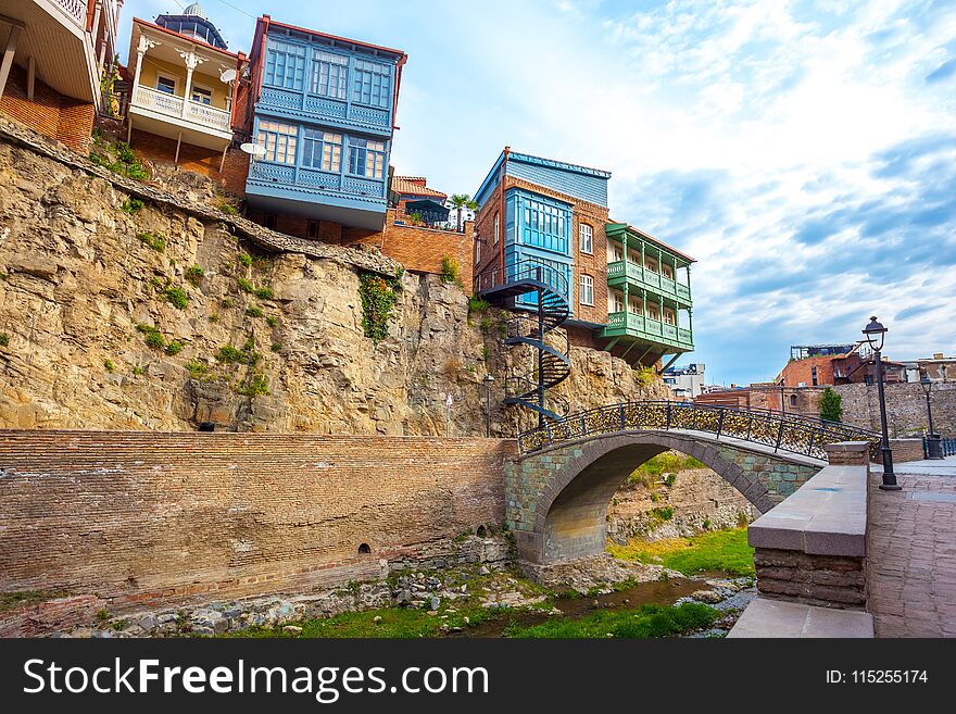 Architecture of the Old Town of Tbilisi, Georgia, in Abanotubani area. Domes of sulfur baths, carved balconies