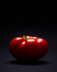 Ripe Tomato On Dark Background Royalty Free Stock Photo