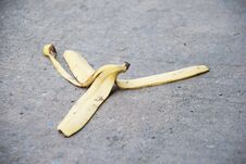 Banana Peel Was Left On The Concrete Floor. The Danger May Slip. Stock Image
