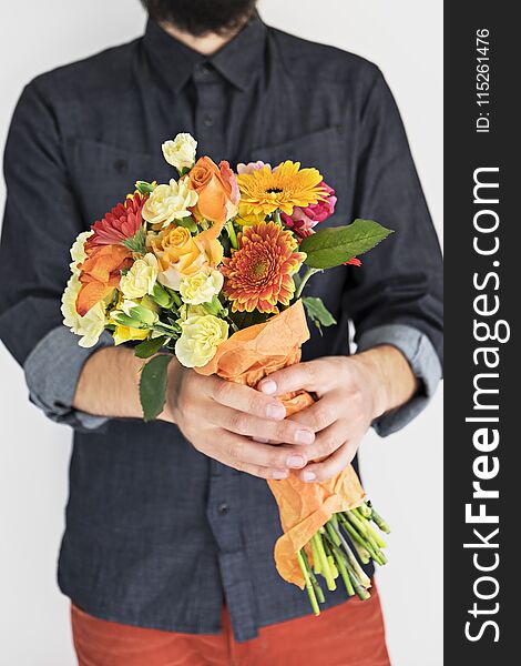 Hipster man with elegant bouquet