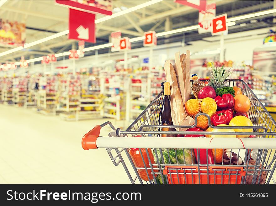 Supermarket shopping groceries shopping cart shelf store aisle