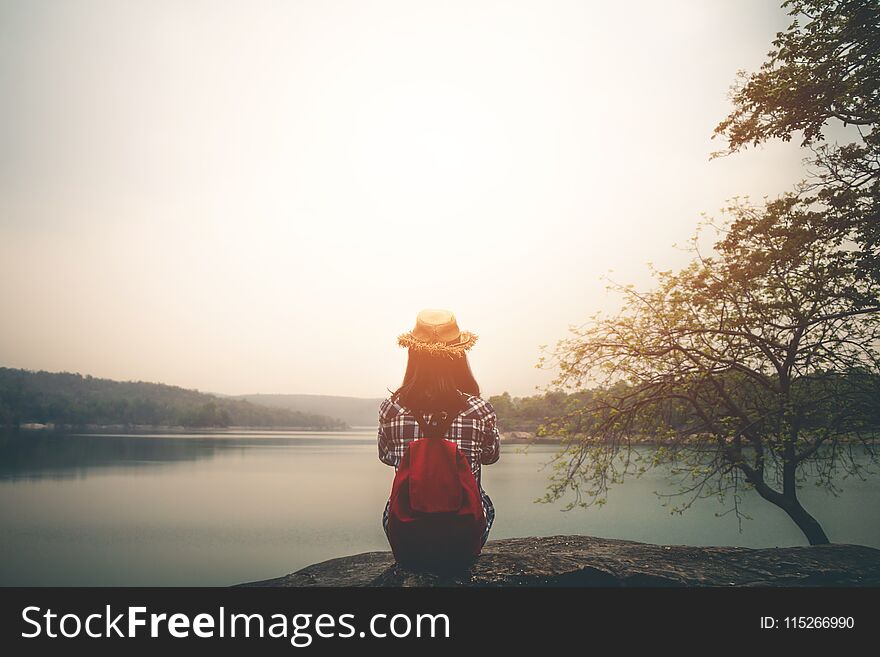 Female tourists in beautiful nature in tranquil scene in holiday.