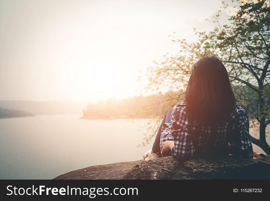 Female tourists in beautiful nature in tranquil scene in holiday.