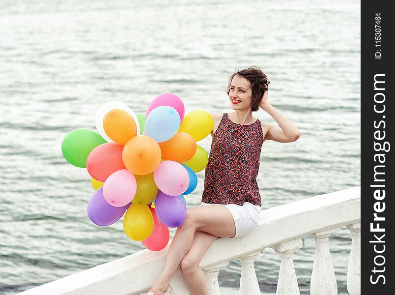 Girl with colorful balloons outdoor. Girl with colorful balloons outdoor