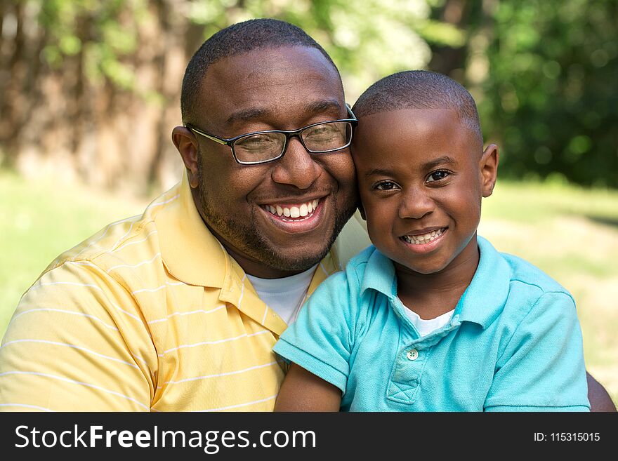 Father Hugging His His Son.