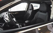 Luxury Car Interior - Steering Wheel, Shift Lever, Dashboard And Computer Stock Photo Luxury Car Interior - Steering Wheel, Shift Lever, Dashboard And Computer Stock Photo