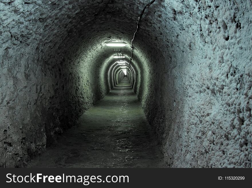 Dark tunnel from Turda salt mine in Romania