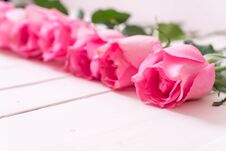 Pink Rose In Vase On Wood Background Royalty Free Stock Photo