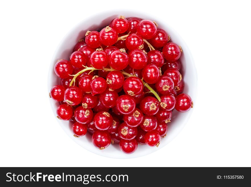 Red currants berries from above bowl isolated on a white background. Red currants berries from above bowl isolated on a white background