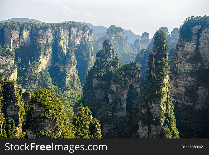 This spectacular view is taken on the peak of yuanjiajie mountain, it`s well known as avatar mountain or hallelujah mountain, in Zhangjiajie, hunan province, China. This spectacular view is taken on the peak of yuanjiajie mountain, it`s well known as avatar mountain or hallelujah mountain, in Zhangjiajie, hunan province, China