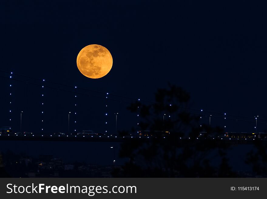 Super Blue Blood Moon Behind Bosphorus Bridge in Istanbul, Turkey