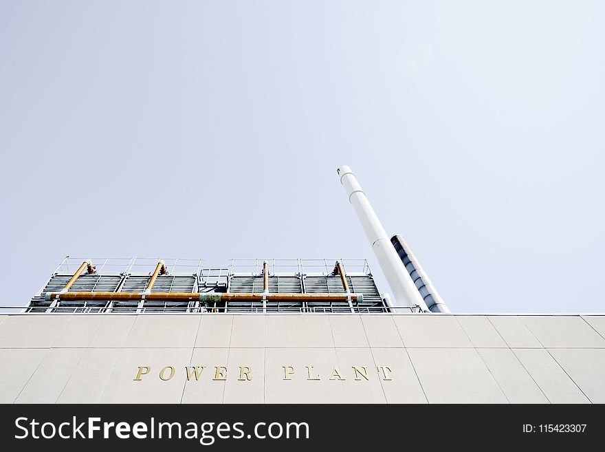 Low Angle Photo of Power Plant Tower