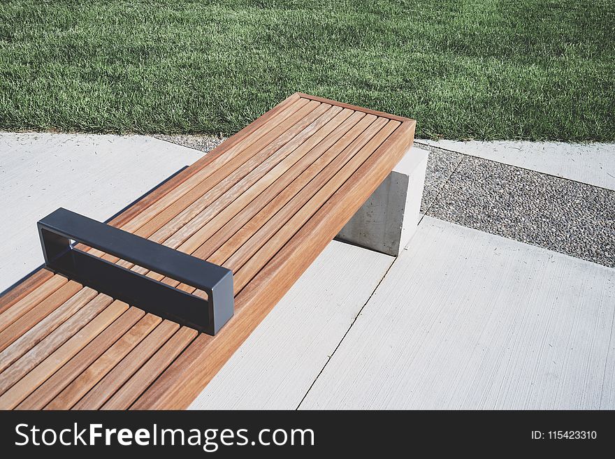Photo of Wooden Bench near Grass