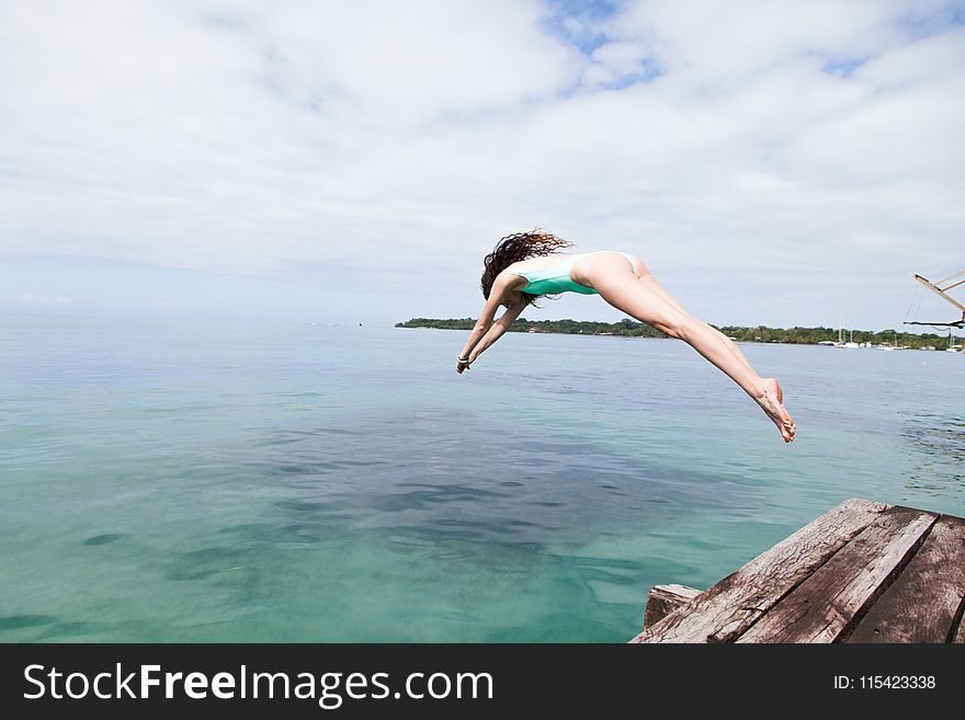 Photo of Woman Diving Into the Water