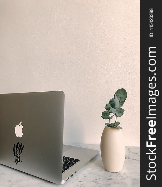 Photo of Macbook on Granite Desk