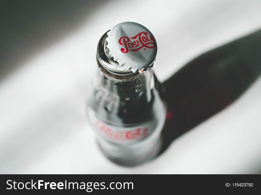 Opened Coca-cola Soda Bottle