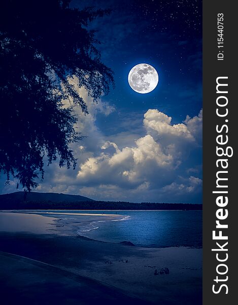 Beautiful landscape view on seascape to night. Attractive many stars and bright full moon on dark blue sky with cloudy. Serenity nature background, outdoors at nighttime. The moon taken with my own camera. Beautiful landscape view on seascape to night. Attractive many stars and bright full moon on dark blue sky with cloudy. Serenity nature background, outdoors at nighttime. The moon taken with my own camera.