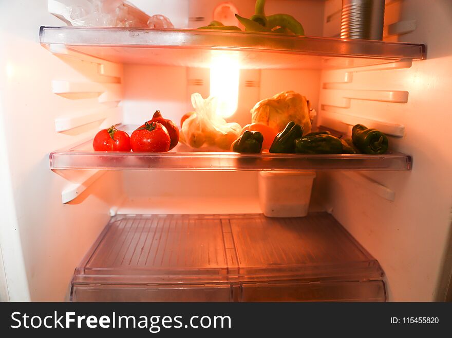 Vegetables and fruits inside refrigerator shelfs and drawers