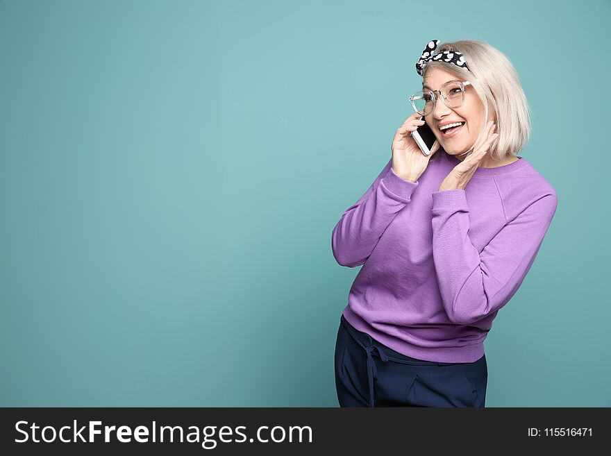 Mature woman talking on mobile phone