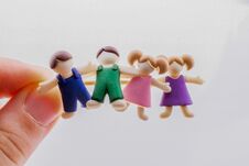 Little Boys And Girls Kid Figurines In Hand Stock Images