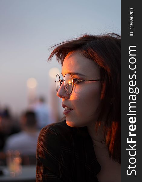 Close-Up Photography Of A Woman Wearing Eyeglasses