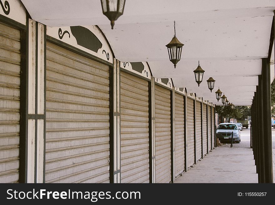 Wide Angle Photo of Gray Roller Shutters